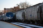 Maryland Midland covered hopper next to Amtrak #20(21)